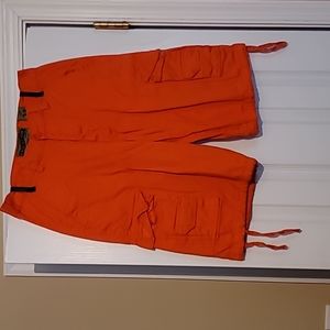 Selling shorts color orange